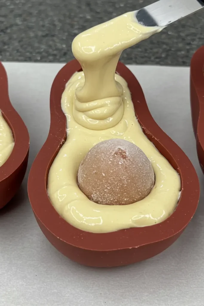 Pear Shaped Pastry 19 Cut open pear shaped pastry showing creamy filling