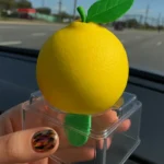 Propitious Lemon Shaped Ice Cream 18 Propitious Lemon Shaped Ice Cream with bite showing white chocolate and lemon cream layers