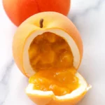 Fruit Shaped Dessert – 8 Easy Ways To Impress Guests At Home 8 Fruit Shaped Dessert with vibrant red, green, and yellow color gradient