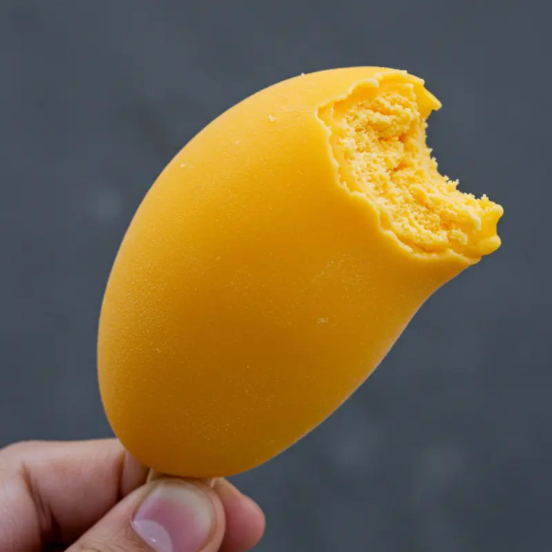 Mango Shaped Ice Cream: 5 Viral Flavor Desserts 14 bite taken from mango shaped ice cream