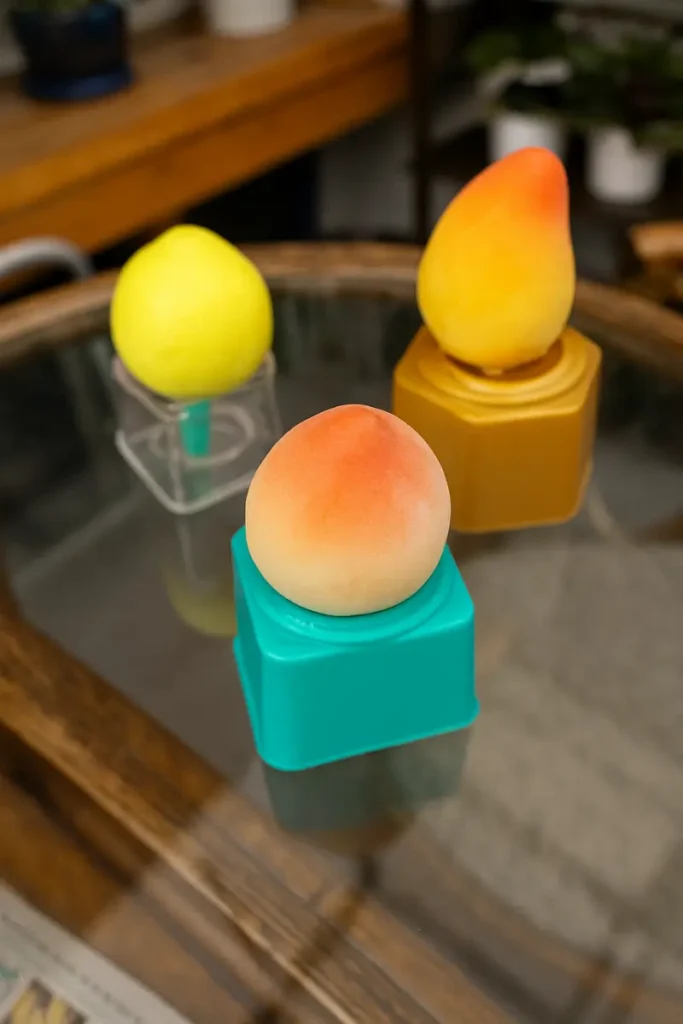 Asian Fruit Ice Cream: Top 5 Most Popular Flavors Right Now 13 peach, mango, and lemon flavored asian fruit ice cream bars on colorful stands