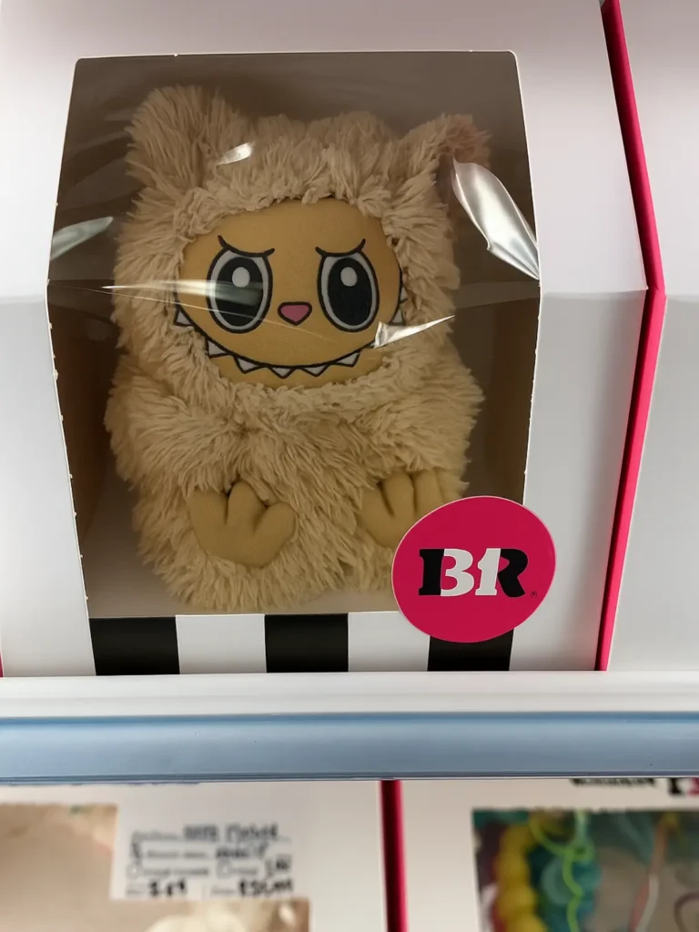 Where to Buy Labubu Cake from Baskin Robbins Near You 2 Pink and teal Labubu cakes with bunny ears and monster horns side by side