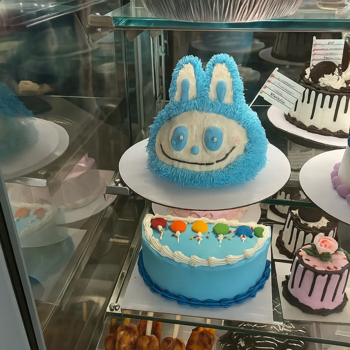 Make an Easy No Bake Pumpkin Cheesecake 3 Blue Labubu cake from Baskin Robbins with fuzzy icing and bunny ears