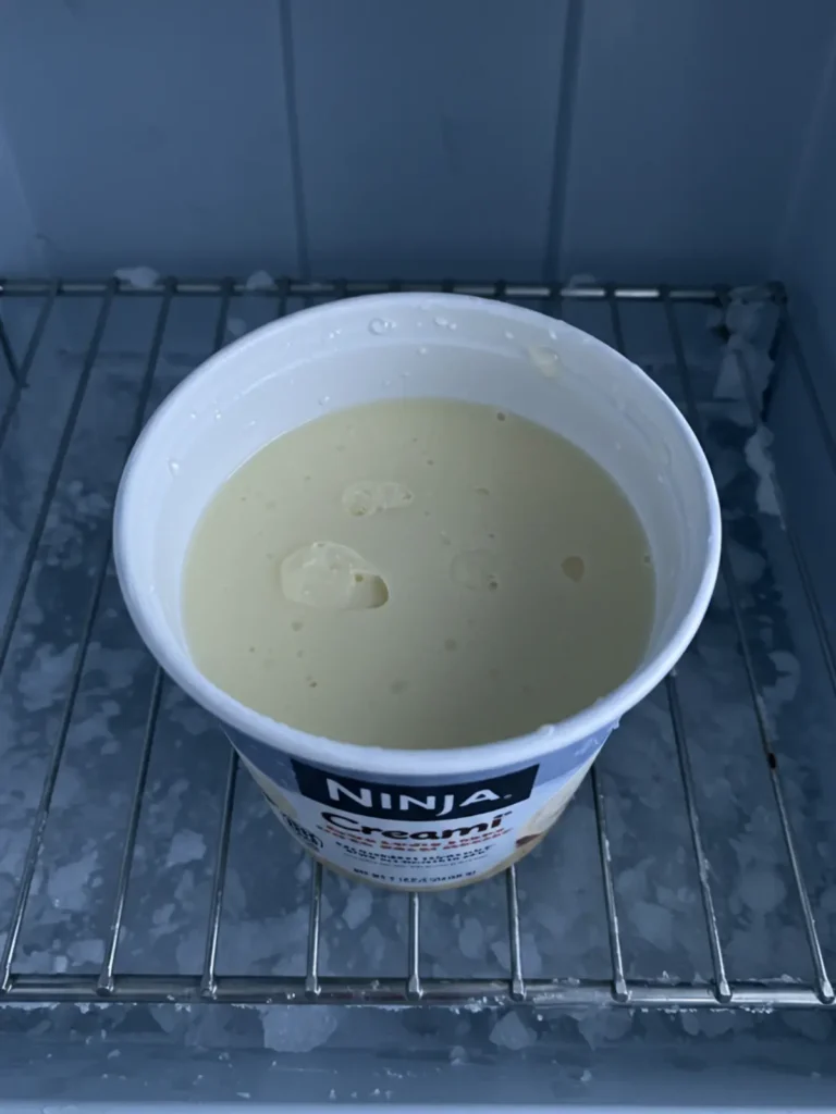 A bowl of homemade dessert from a Ninja Creami frozen yogurt recipe.